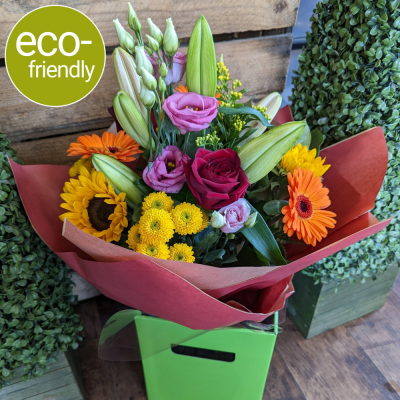 Through the Rainbow - Eco - This vibrant collection of special flowers, beautifully arranged and hand-tied makes the perfect statement. Our Through the Rainbow is a very versatile bouquet and is <b>suitable for any occasion</b>, it is by far our most popular bouquet! Which is why we’ve given it an eco-friendly makeover. <b>Your beautiful eco-friendly gift will be presented in kind to the planet, complimentary bright kraft packaging.</b>