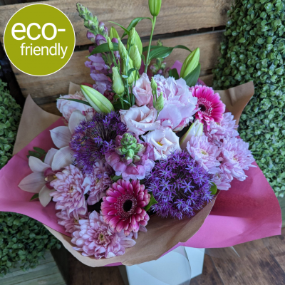 Cherry Blossom - Eco - Our <b>Cherry Blossom</b> is a vibrant pink hand-tied bouquet that is simply stunning, just like its inspiration - the cherry blossom tree. This bouquet is perfect for any occasion, whether you're celebrating a birthday, anniversary, or just want to brighten someone's day. it is consistently one of our most popular bouquets! Which is why we’ve given it an eco-friendly makeover. <b>Your beautiful eco-friendly gift will be presented in kind to the planet, complimentary kraft packaging.</b>