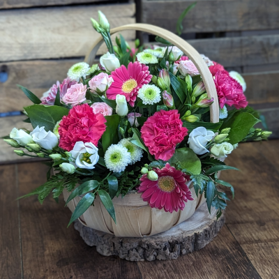 Trug Basket in Bright shades, made by The Floral Box in Darlington - Florist Choice Bright Basket Arrangement. A unique basket arrangement in vibrant shades using only the freshest, most beautiful blooms of the day. Delivery or Click & Collect