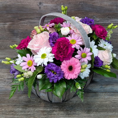 Trug Basket in Bright shades, made by The Floral Box in Darlington - Florist Choice Bright Basket Arrangement. A unique basket arrangement in vibrant shades using only the freshest, most beautiful blooms of the day. Delivery or Click & Collect