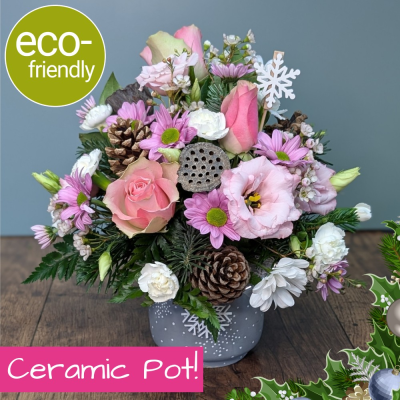 Winter Grace Snowflake Arrangement | Floral Box Darlington - A serene winter tribute. Our Snowflake Arrangement features soft pastels and icy whites in a festive pot. Hand-crafted in Darlington.